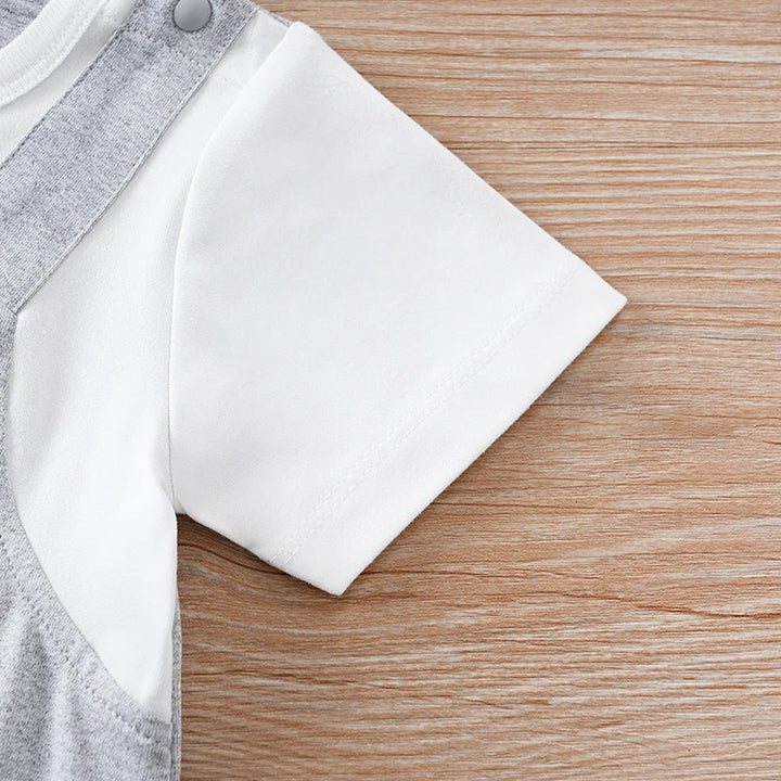 Gray and white fabric on a wooden surface