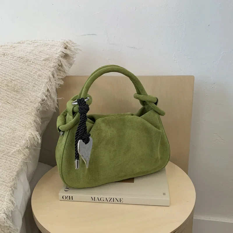 Small suede crossbody handbag, green, top handles and heart key charm