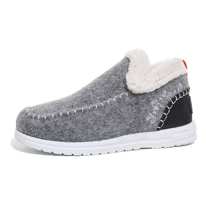 Women's grey slip-on ankle loafer with white fleece collar and white rubber sole