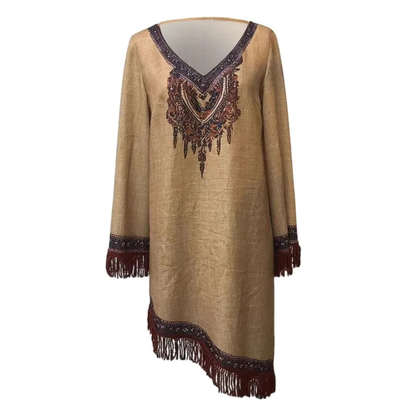 Beige dress with intricate brown embroidery and fringe details on a white background