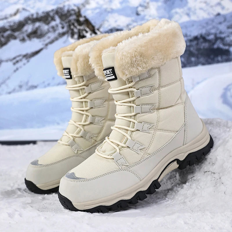 Women’s winter snow boots in light beige with lace-up design and fuzzy top lining.