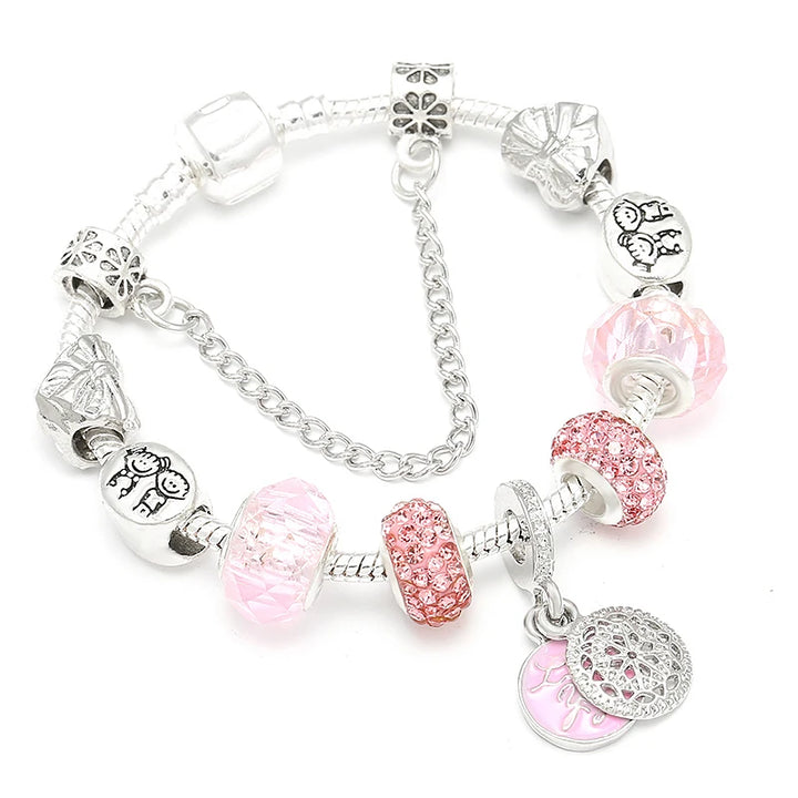 Silver-tone bracelet with pink crystal beads and heart pendant charm