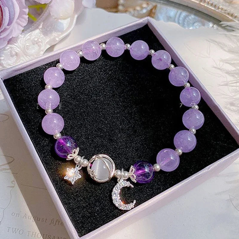 Lavender bead elastic bracelet with star and crescent charms in a gift box