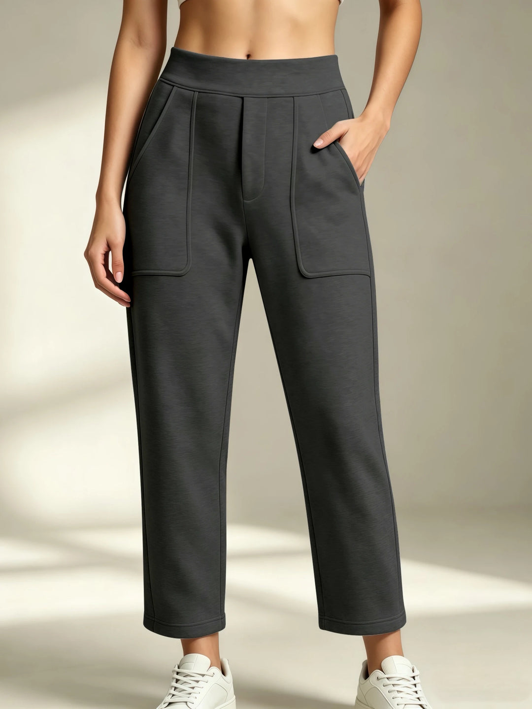 Women's dark gray straight-leg sweatpants with an elastic waist and front patch pockets