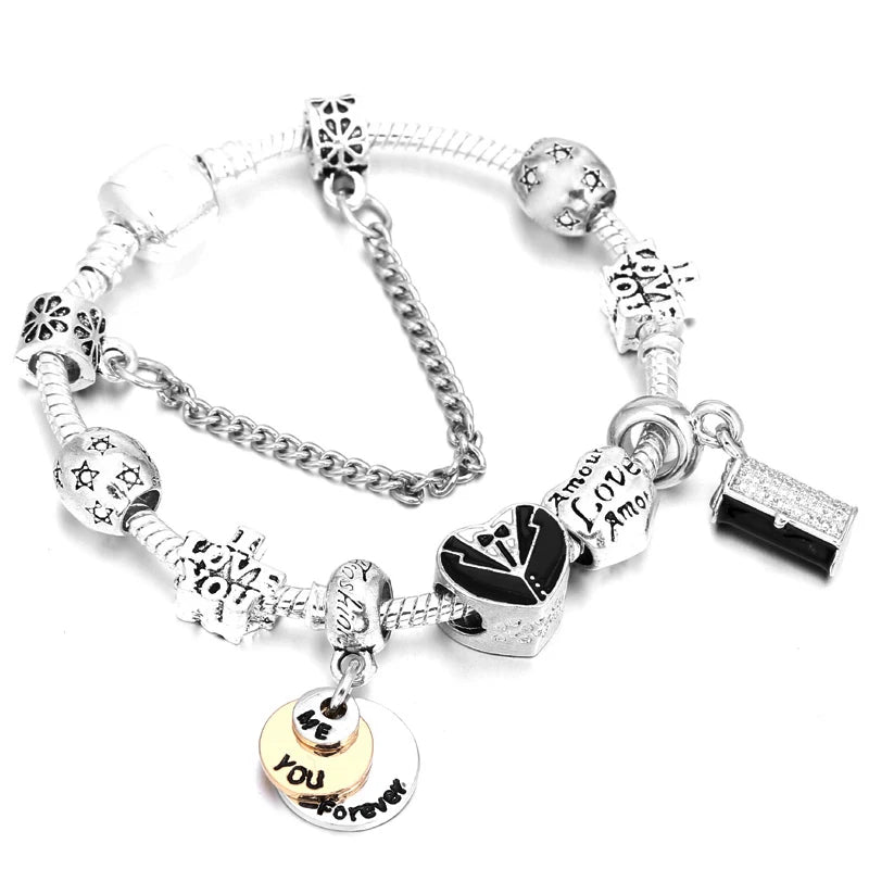 Silver-tone bracelet with heart-shaped charm and beads with sparkling accents