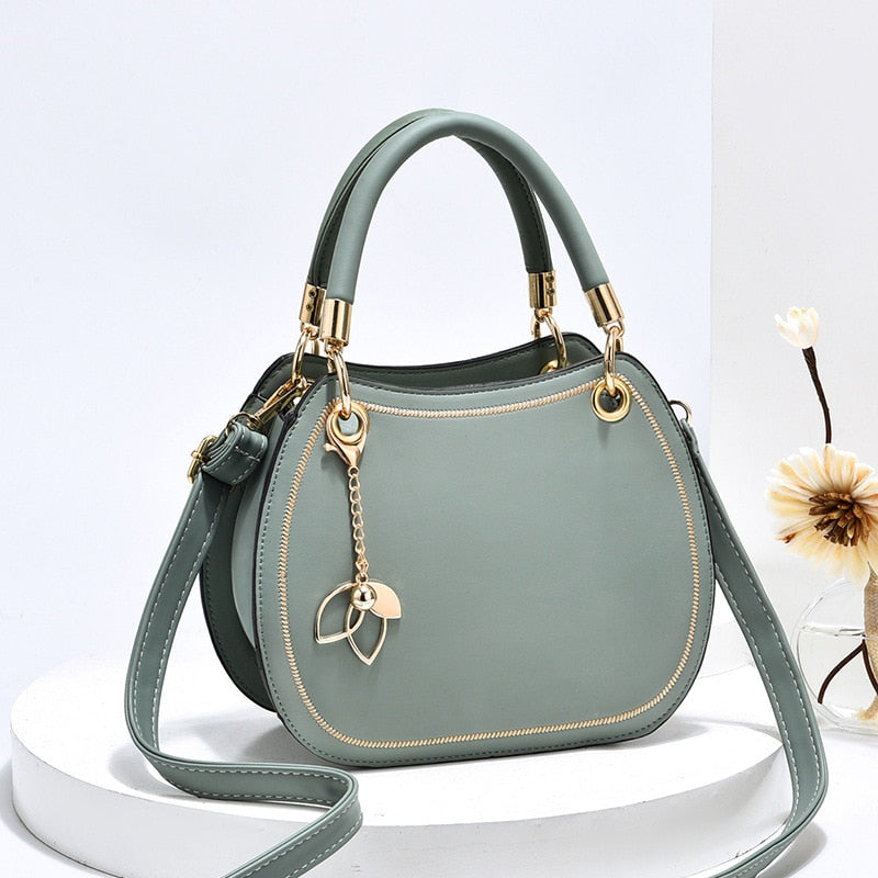 Trendy Leather Saddle Shape Flower Pendant  Messenger Handbags 