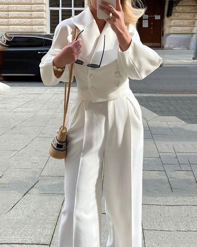 White cropped blazer and pleated high-waist trousers suit, two-button front