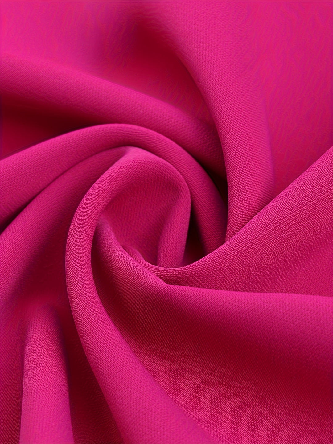 Close-up of pink fabric with folds