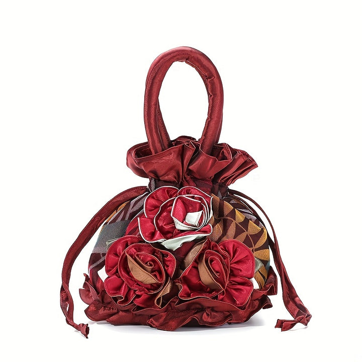 Red handbag with floral design on a white background