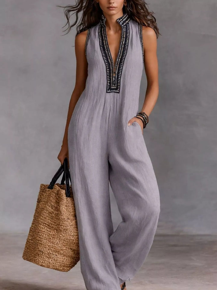 Lavender sleeveless wide-leg jumpsuit with embroidered V-neck trim