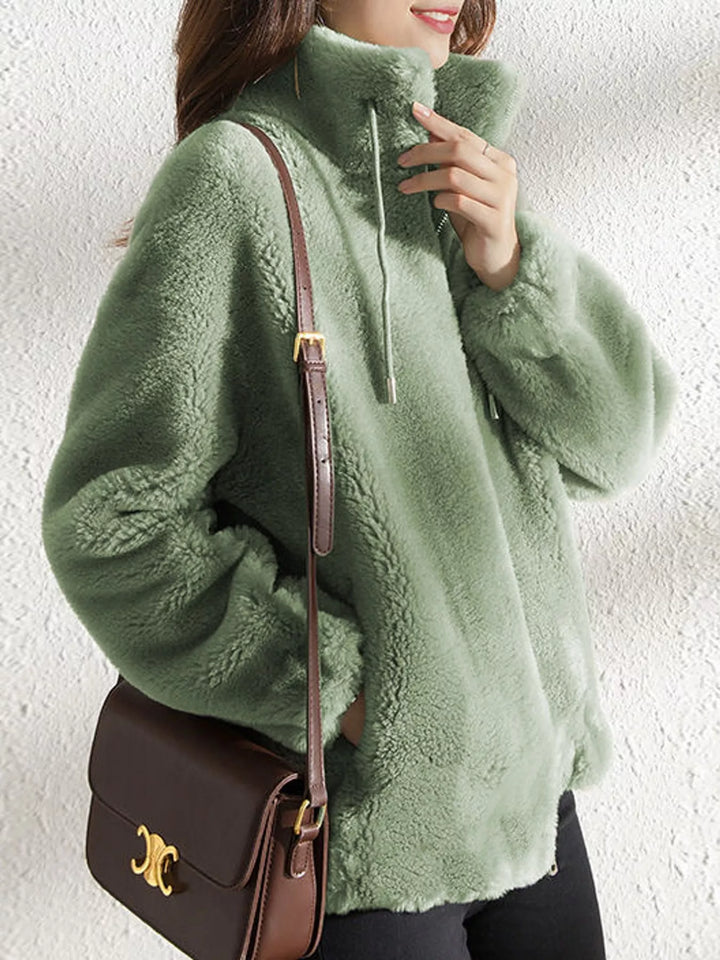 Green faux fur stand-collar zip jacket with drawstring ties, front view