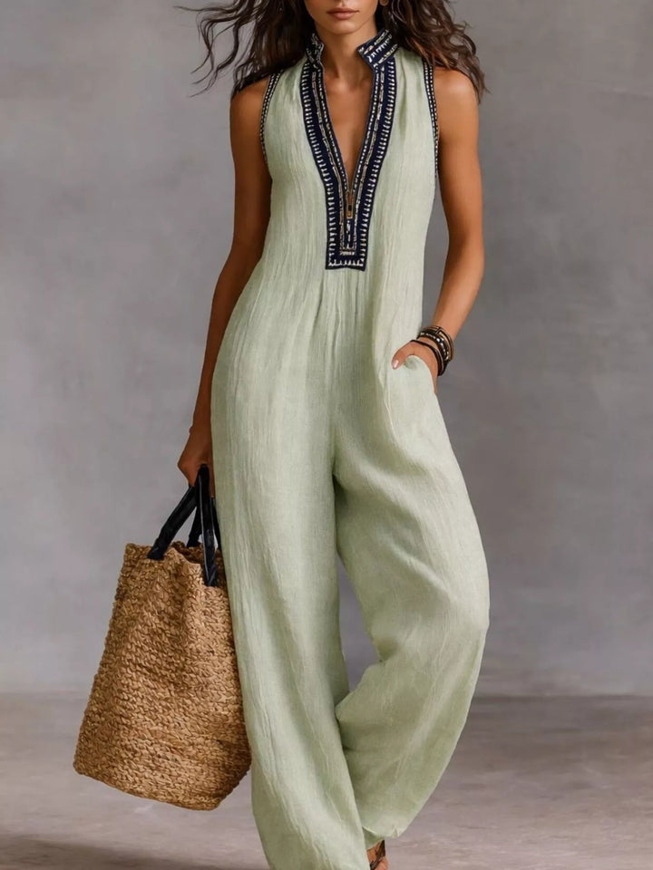 Light green sleeveless wide-leg jumpsuit with embroidered V-neck placket