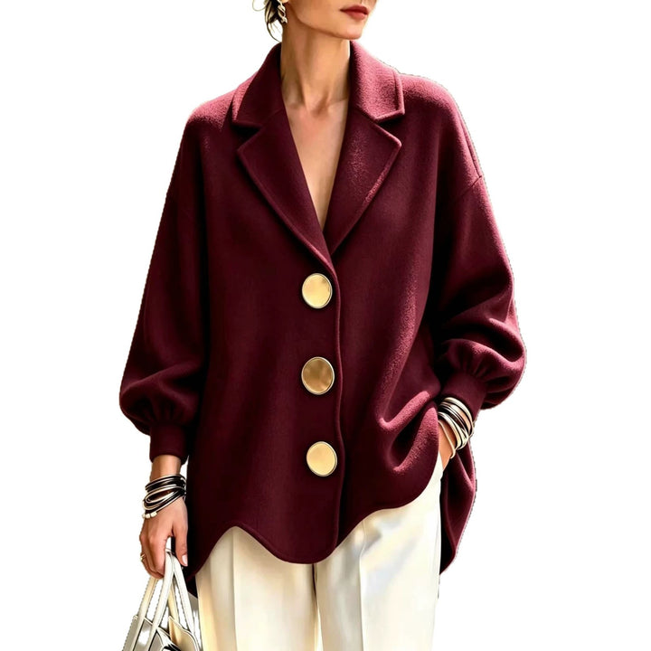 Women's Wine Red Collared Blouse With Three Gold-Tone Buttons And Puff Sleeves Against A White Background