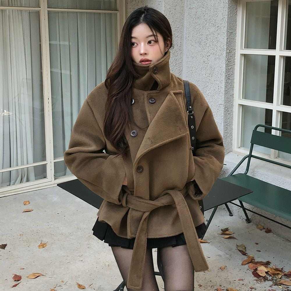 Brown wool short coat with stand-up collar, double-breasted buttons, and matching belt
