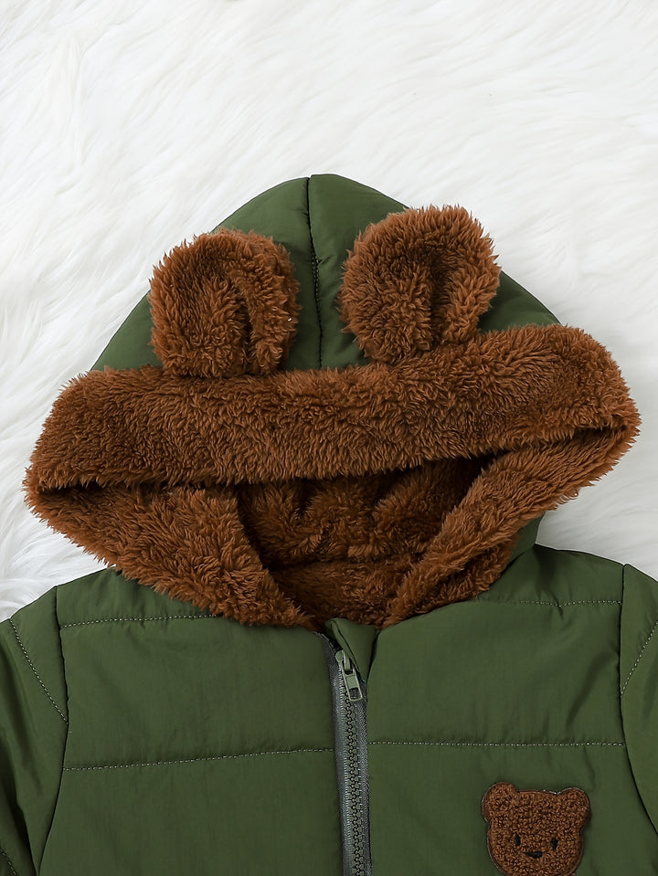 Green jacket with brown fleece hood on a white background