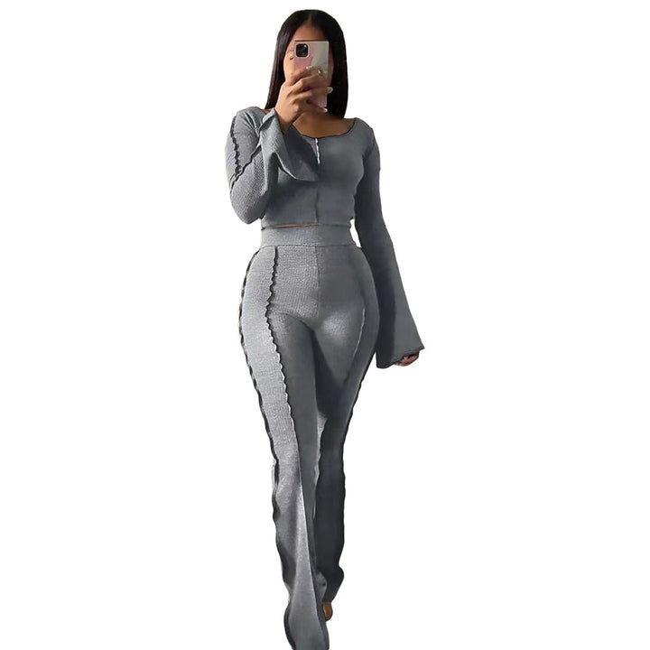 Woman in house wearing snug-fit grey Yoga Sets