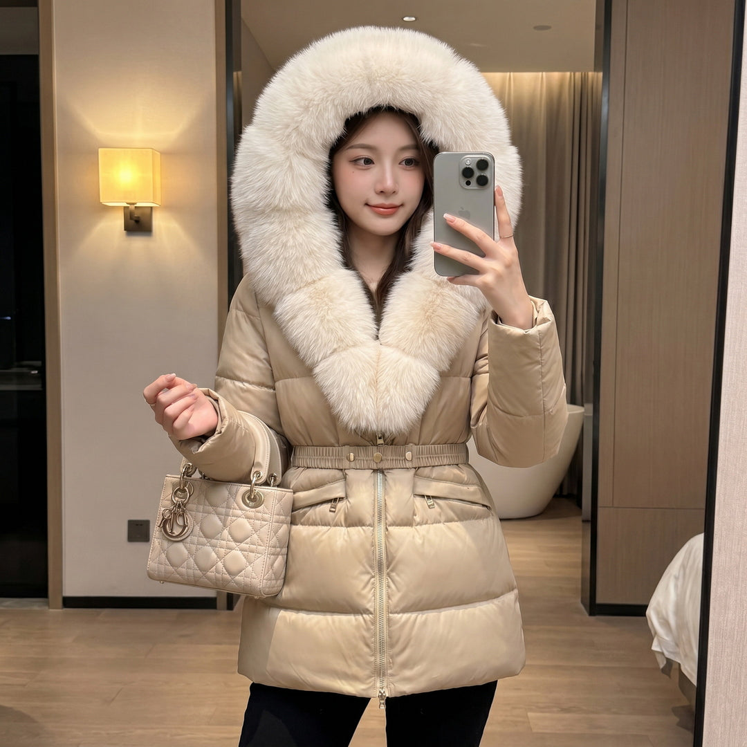 Women’s Khaki Belted Puffer Coat With Cream Fur-Trimmed Hood, Modeled From The Front.