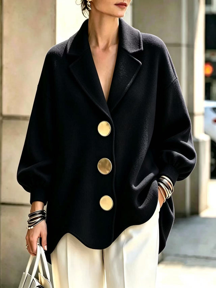 Women's Black Collared V-Neck Blouse With Three Gold-Tone Buttons And Long Puff Sleeves, Close Front View