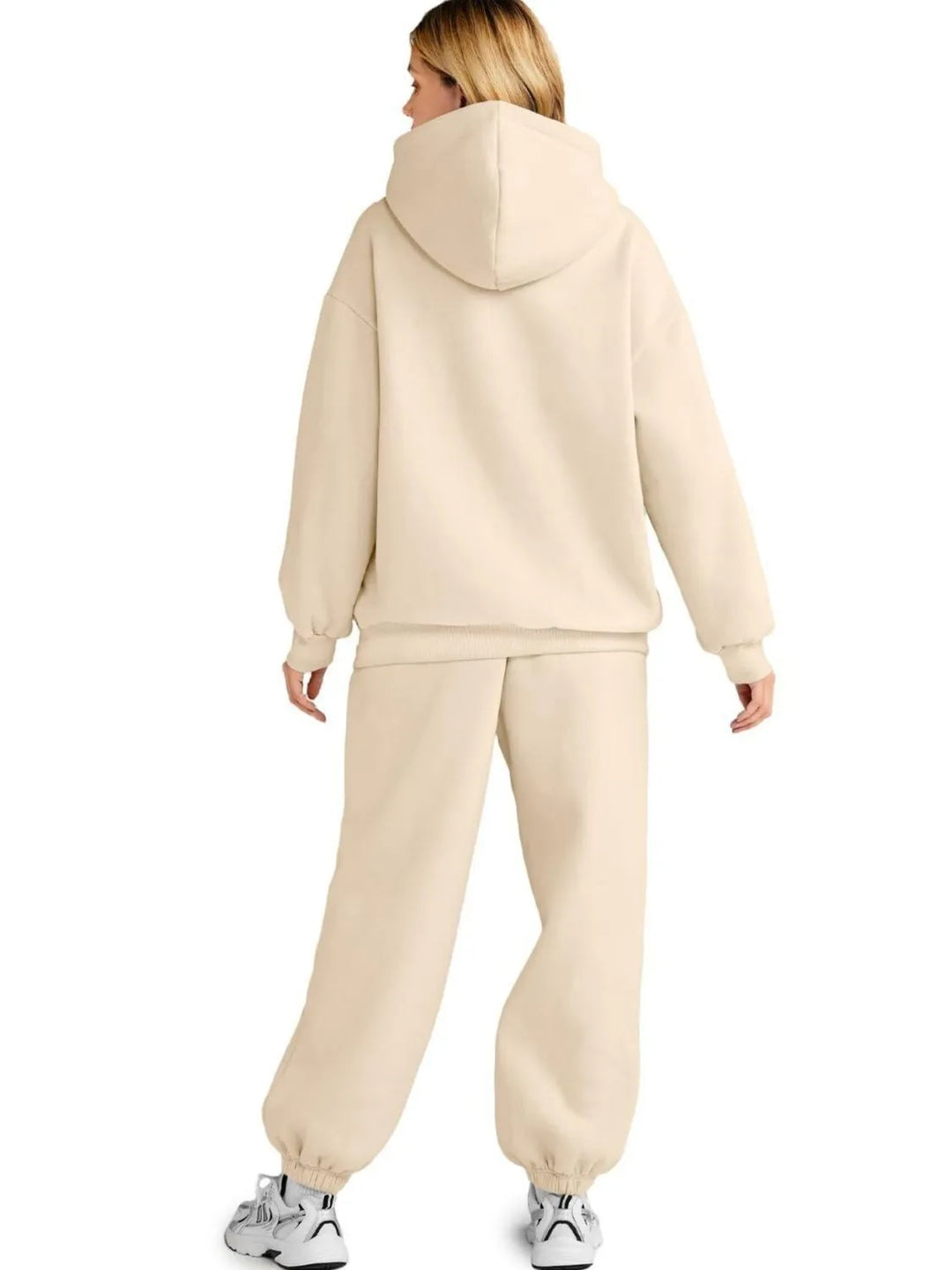 Back view of plus-size apricot-beige hoodie and jogger set with hood and cuffs