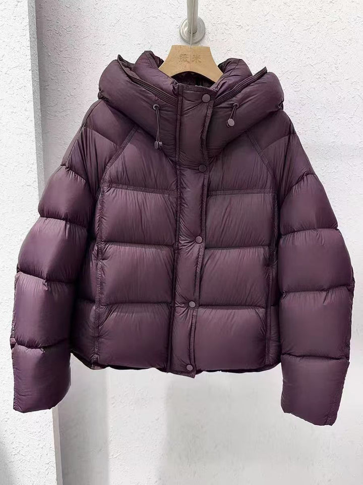 Women's plus size hooded puffer jacket, deep purple, centered front with hood and zipper