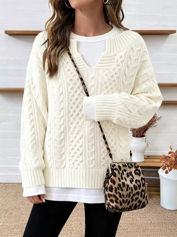 Off-white cable-knit dropped-shoulder sweater with V-neck and ribbed cuffs