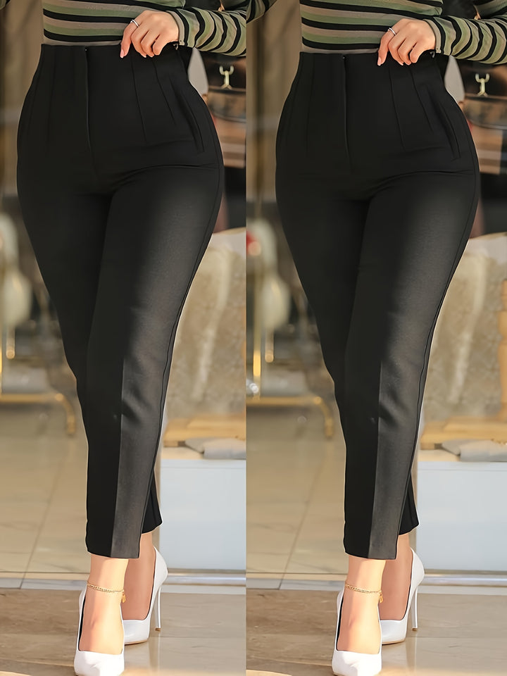 Black pants worn by a person with a blurred background