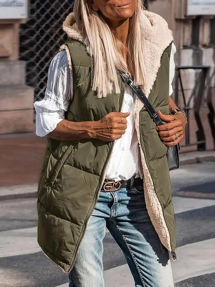 Reversible hooded puffer vest, army green outer with white fleece lining and pockets