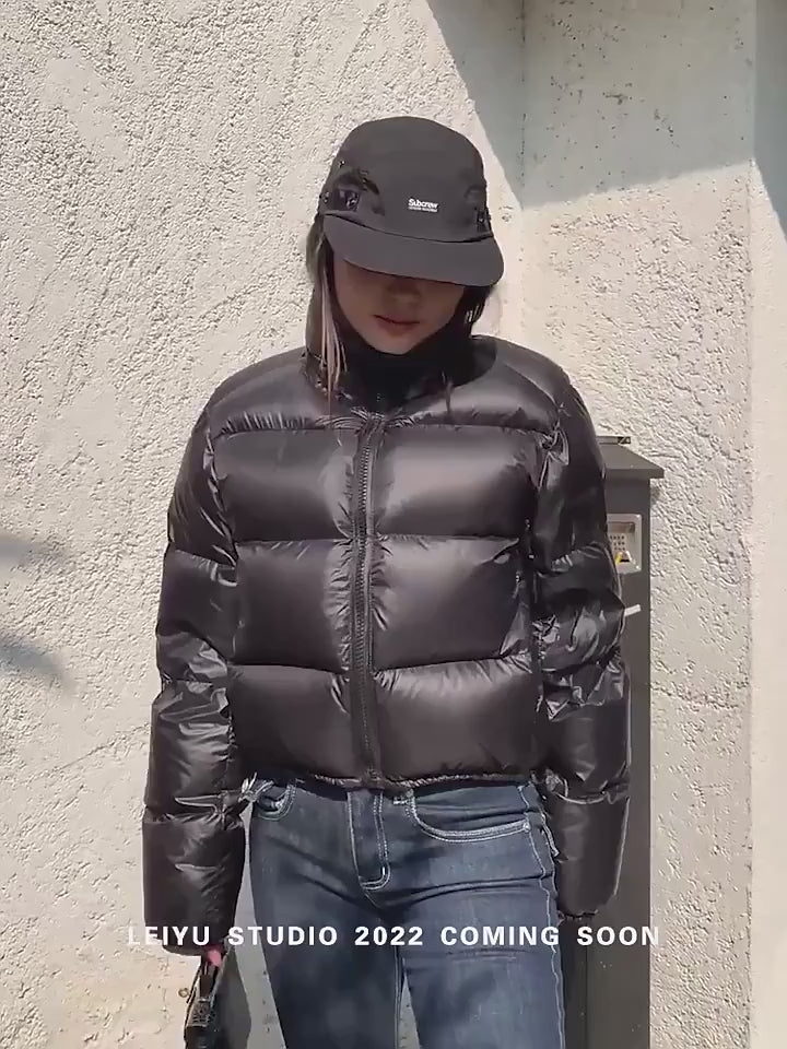 Video of Women wearing thick padded puffer coat.