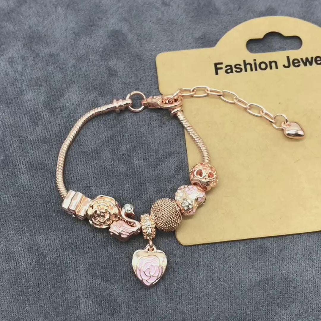 Drip Oil Charm Bracelet — Rose, Swan & Pan Family Motifs In Gold & Silver